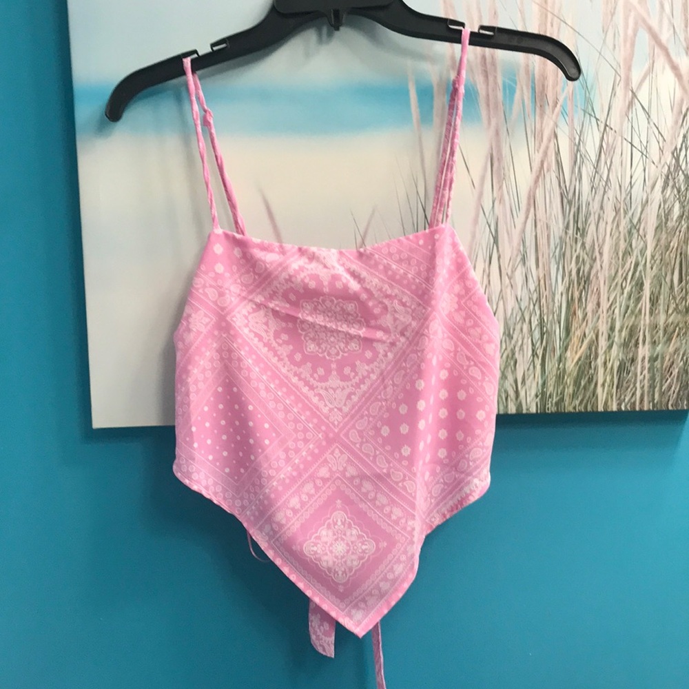Summer top and size large adjustable strap in the back.